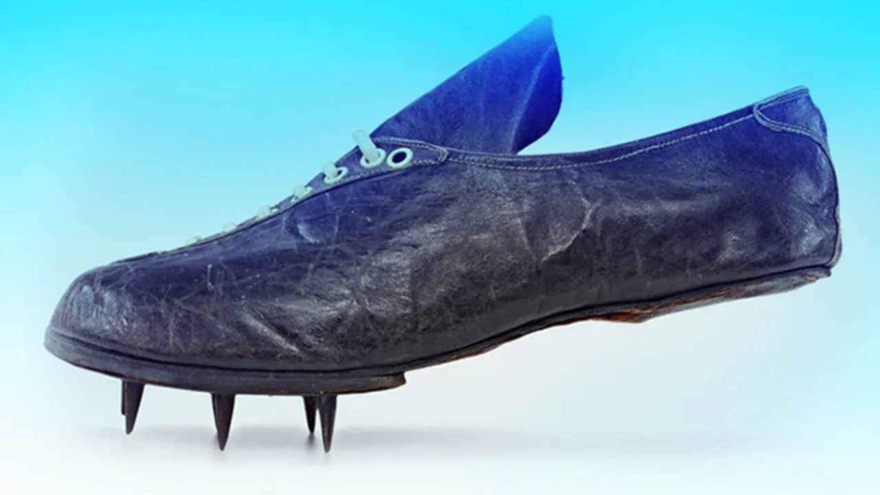 Pronounced metal spikes on an old model football boot
