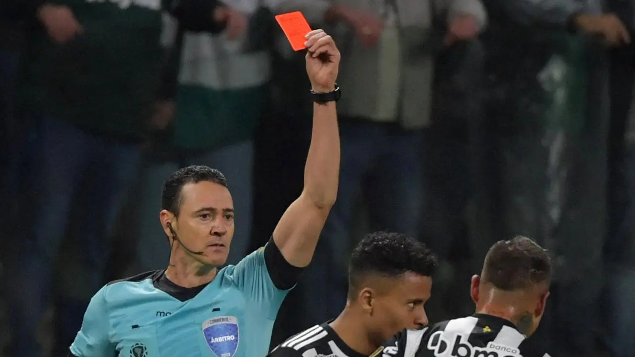 Referee hands out a red card