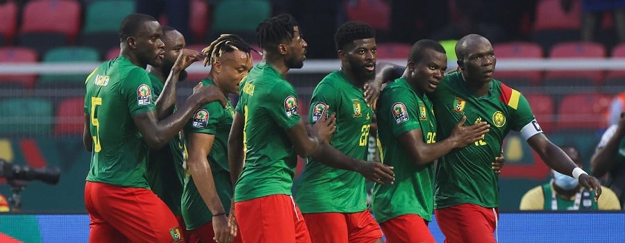 Cameroon football team players celebrate a goal in a past game