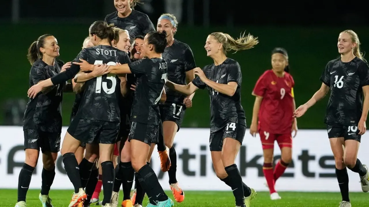 New Zealand women celebrate a goal