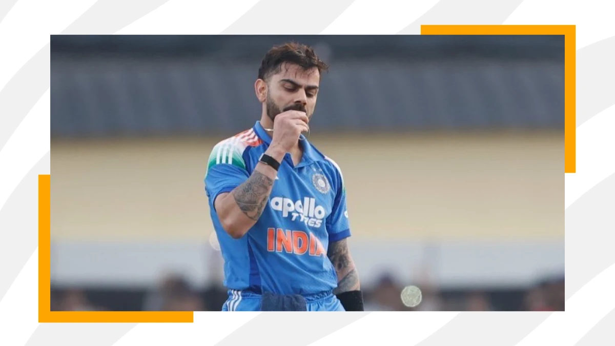 virat kohli holds his pendant