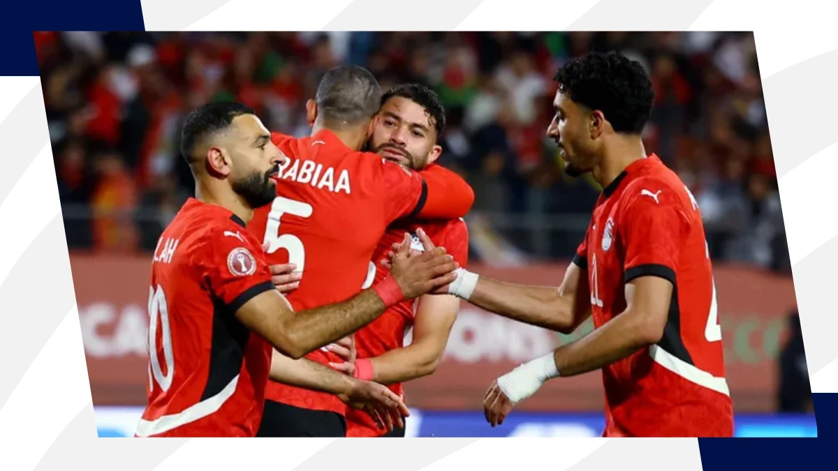 salah and marmoush shaking hands during afcon
