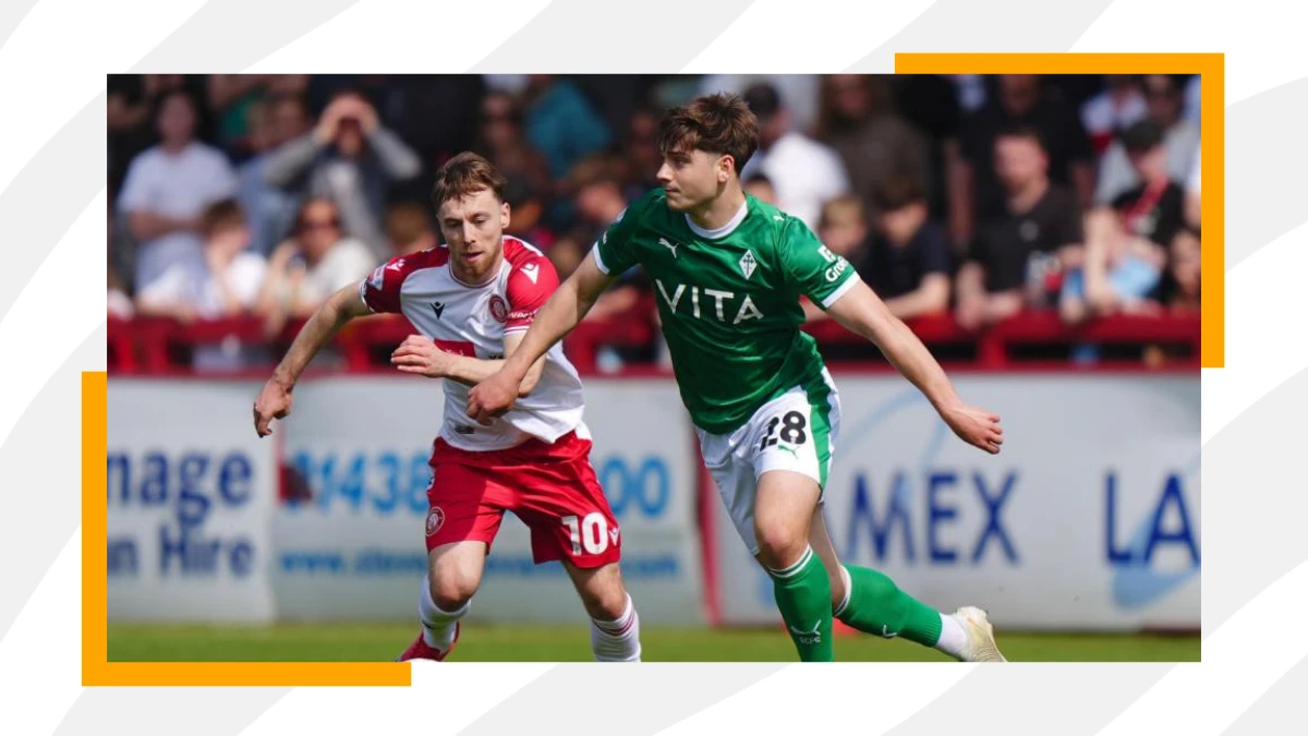 josh stokes runs past stevenage player during a promotion play-off match