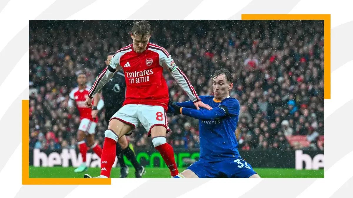 martin odegaard of arsenal controlling the ball