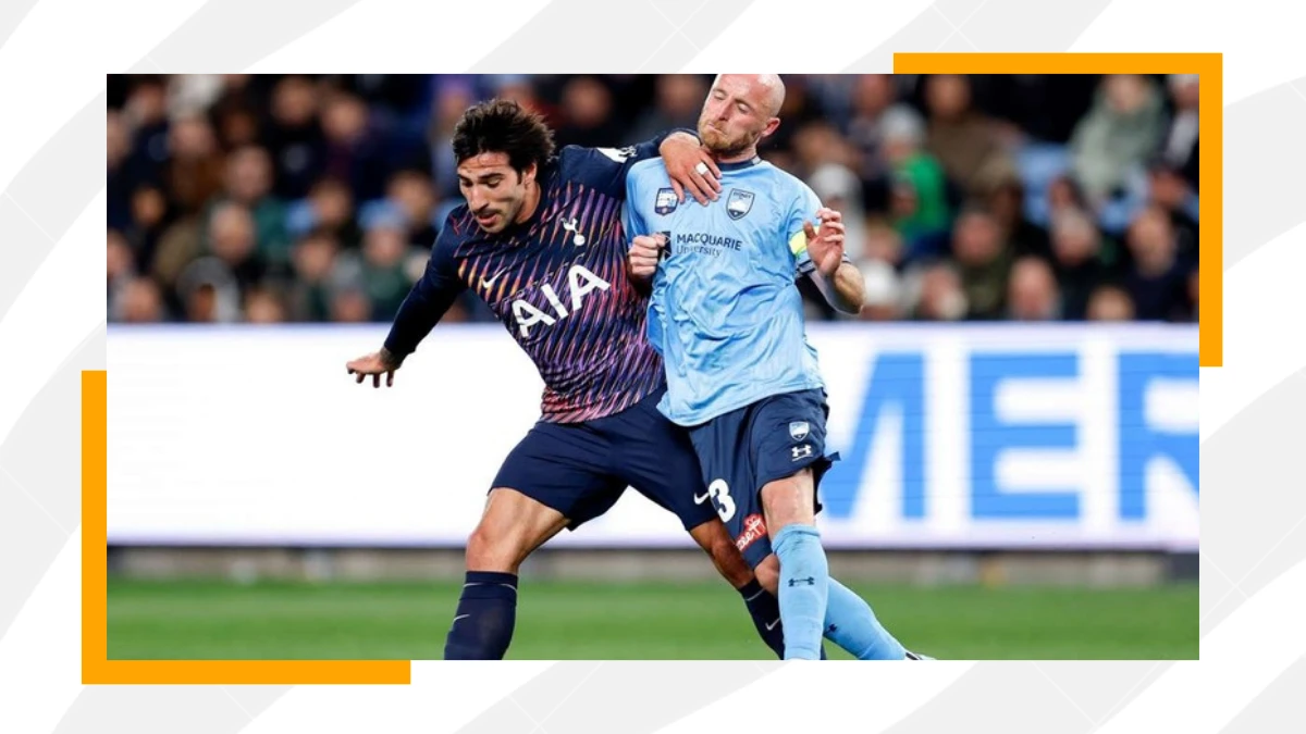 sandro tonali holds off sydney fc player