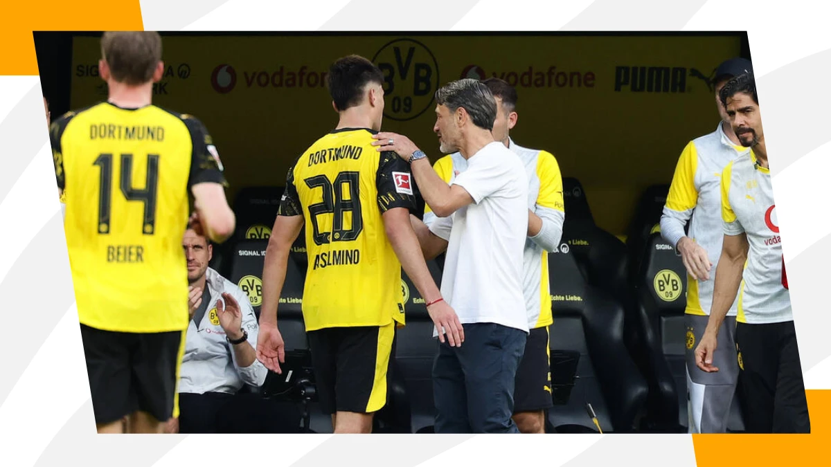 aaron anselmino taking feedback from coach niko kovac after being substituted