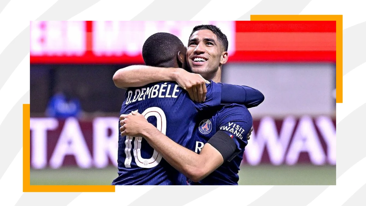 dembele and hakimi share a warm hug